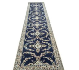Surface texture of 2000s Nain rug with natural Wool and intricate pattern