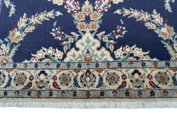 Central medallion detail of 2000s Nain rug from Iran / Persia
