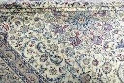 Close-up detail of 2000s Nain rug from Iran / Persia showing Wool weave
