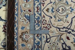 Backside of handmade 2000s Nain rug showing knot structure and weave density