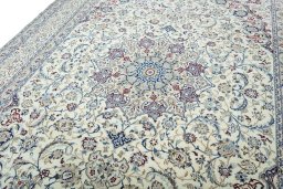 Backside of handmade 2000s Nain rug showing knot structure and weave density