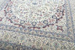 Close-up detail of 2000s Nain rug from Iran / Persia showing Wool weave