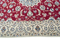 Corner detail of New Nain rug showing border pattern and Wool pile