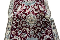 Surface texture of New Nain rug with natural Wool and intricate pattern