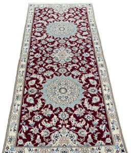 Surface texture of New Nain rug with natural Wool and intricate pattern