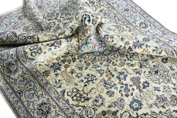 Surface texture of New Nain rug with natural Wool and intricate pattern