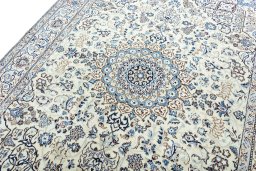 Backside of handmade New Nain rug showing knot structure and weave density