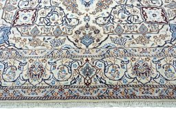 Full view of New Nain rug from Iran / Persia, 306 × 206 cm in Beige tones