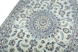 Backside of handmade 2000s Nain rug showing knot structure and weave density