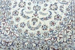 Close-up detail of 2000s Nain rug from Iran / Persia showing Wool weave