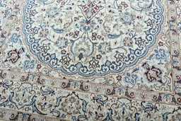 Close-up detail of 2000s Nain rug from Iran / Persia showing Wool weave