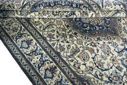 Close-up detail of 2000s Nain rug from Iran / Persia showing Wool weave