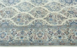 Corner detail of New Nain rug showing border pattern and Cork pile