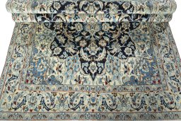 Close-up detail of 2000s Nain rug from Iran / Persia showing Wool weave