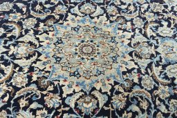 Central medallion detail of 2000s Nain rug from Iran / Persia