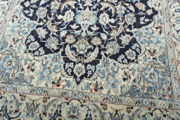 Close-up detail of 2000s Nain rug from Iran / Persia showing Wool weave