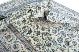 Surface texture of New Nain rug with natural Wool and intricate pattern