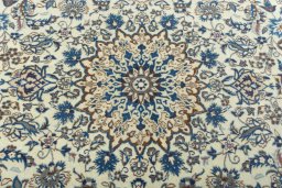 Central medallion detail of 2000s Nain rug from Iran / Persia