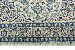 Full view of 2000s Nain rug from Iran / Persia, 210 × 124 cm in Beige tones
