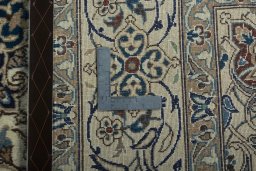 Backside of handmade 2000s Nain rug showing knot structure and weave density