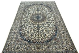 Surface texture of 2000s Nain rug with natural Wool and intricate pattern