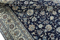 Close-up detail of 2000s Nain rug from Iran / Persia showing Wool weave