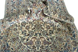 Close-up detail of 2000s Nain rug from Iran / Persia showing Wool weave