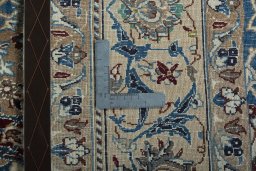 Surface texture of 2000s Nain rug with natural Wool and intricate pattern