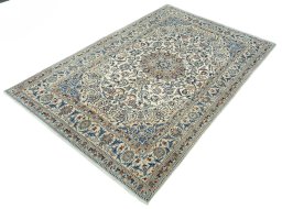 Corner detail of 2000s Nain rug showing border pattern and Wool pile