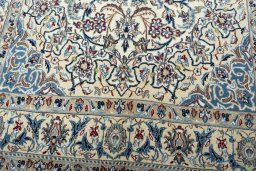 Central medallion detail of 2000s Nain rug from Iran / Persia