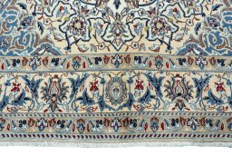 Close-up detail of 2000s Nain rug from Iran / Persia showing Wool weave
