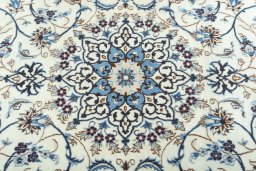 Central medallion detail of 2000s Nain rug from Iran / Persia