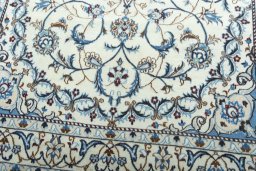 Close-up detail of 2000s Nain rug from Iran / Persia showing Wool weave