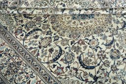 Close-up detail of 2000s Nain rug from Iran / Persia showing Wool weave
