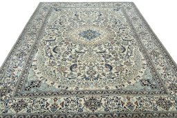 Surface texture of 2000s Nain rug with natural Wool and intricate pattern