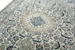 Backside of handmade 2000s Nain rug showing knot structure and weave density