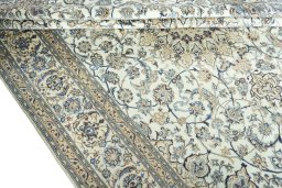 Close-up detail of 2000s Nain rug from Iran / Persia showing Wool weave