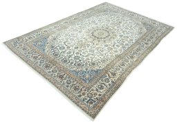 Corner detail of 2000s Nain rug showing border pattern and Wool pile