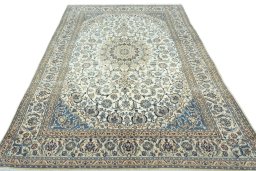 Surface texture of 2000s Nain rug with natural Wool and intricate pattern
