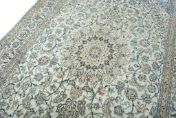 Backside of handmade 2000s Nain rug showing knot structure and weave density