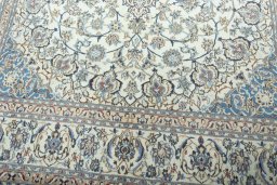 Close-up detail of 2000s Nain rug from Iran / Persia showing Wool weave