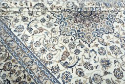 Close-up detail of 2000s Nain rug from Iran / Persia showing Wool weave