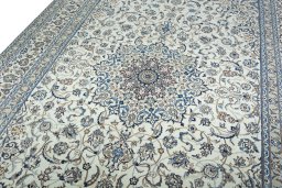 Backside of handmade 2000s Nain rug showing knot structure and weave density