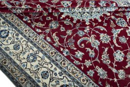 Close-up detail of 2000s Nain rug from Iran / Persia showing Wool weave