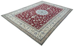 Corner detail of 2000s Nain rug showing border pattern and Wool pile
