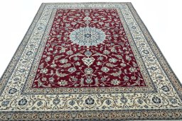 Surface texture of 2000s Nain rug with natural Wool and intricate pattern