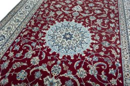 Backside of handmade 2000s Nain rug showing knot structure and weave density