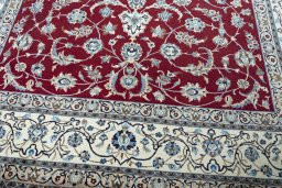 Close-up detail of 2000s Nain rug from Iran / Persia showing Wool weave