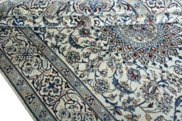 Close-up detail of 2000s Nain rug from Iran / Persia showing Wool weave