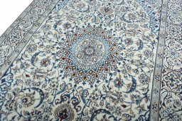 Backside of handmade 2000s Nain rug showing knot structure and weave density